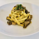 A plate of pasta with mushrooms for Giannetti Artisans Tagliatelle Pasta Recipe with Italian Porcini Mushrooms