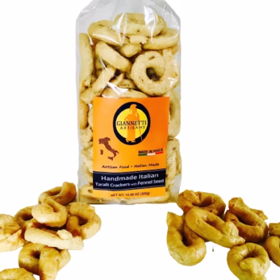 Front view of a clear bag of Giannetti Artisans handmade fennel taralli crackers on a white background