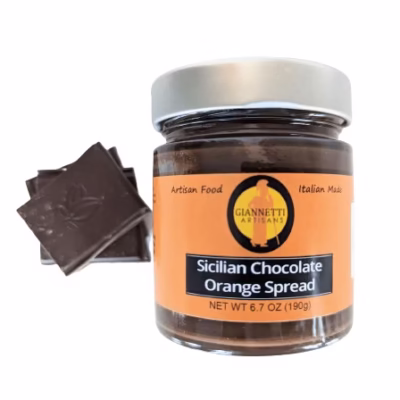 7 oz  jar of Giannetti Artisans Sicilian chocolate orange spread with pieces of chocolate on the side on a white background